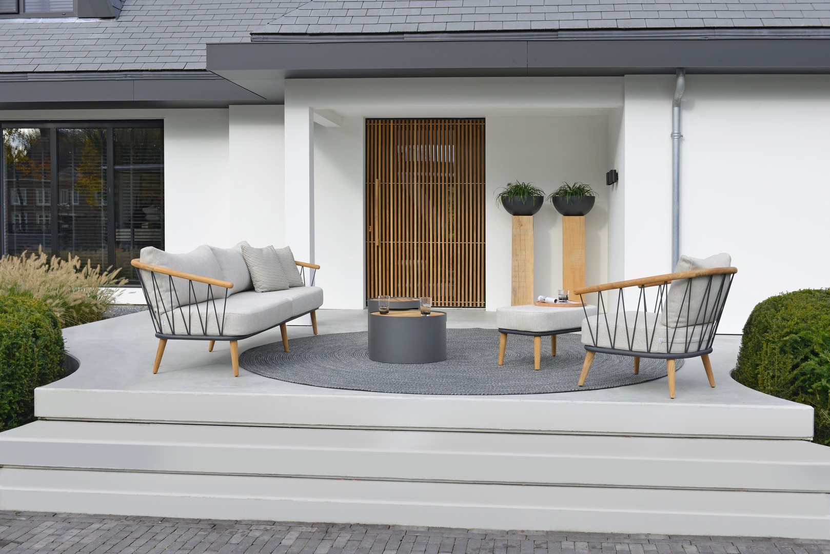 2021 Borek teak-coated stainless steel Coimbra lounge chair, sofa & ottoman - teak-aluminium Furore side tables 5000.jpg