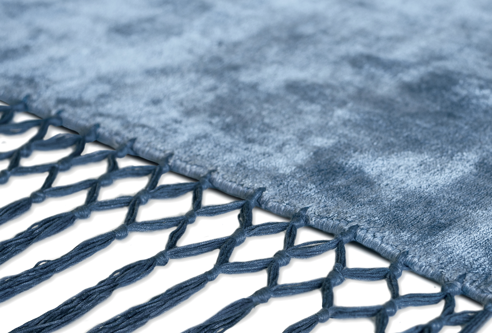 Baxter Fringes Azure + Blue carpet.jpg