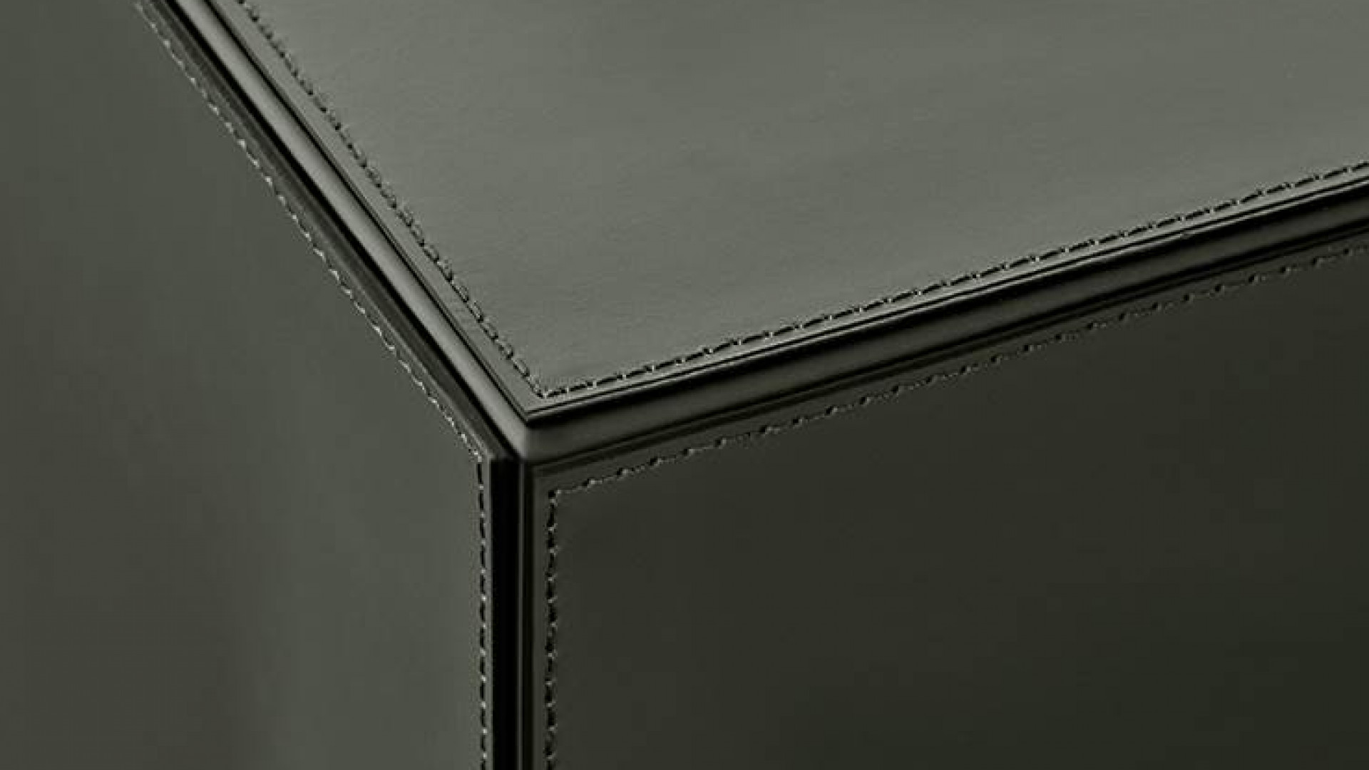 Solid saddle-hide coffee table/ottoman